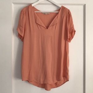 Peach coloured blouse